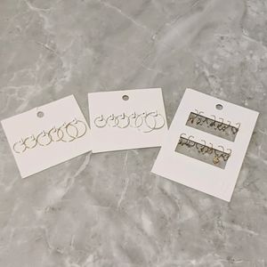 BRAND NEW H&M SILVER AND GOLD HOOP EARRINGS